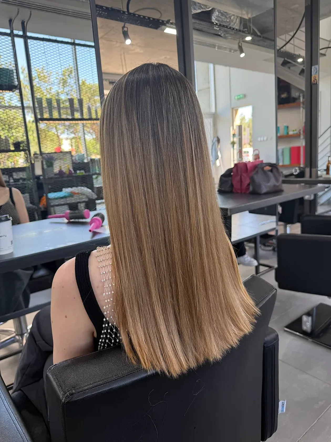 Long balayage, soft honey blonde, finished in the salon